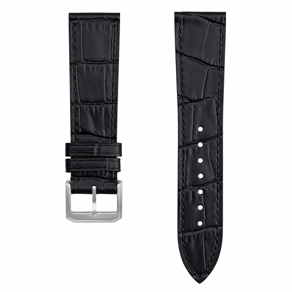 Black embossed leather watch strap with silver buckle on white background