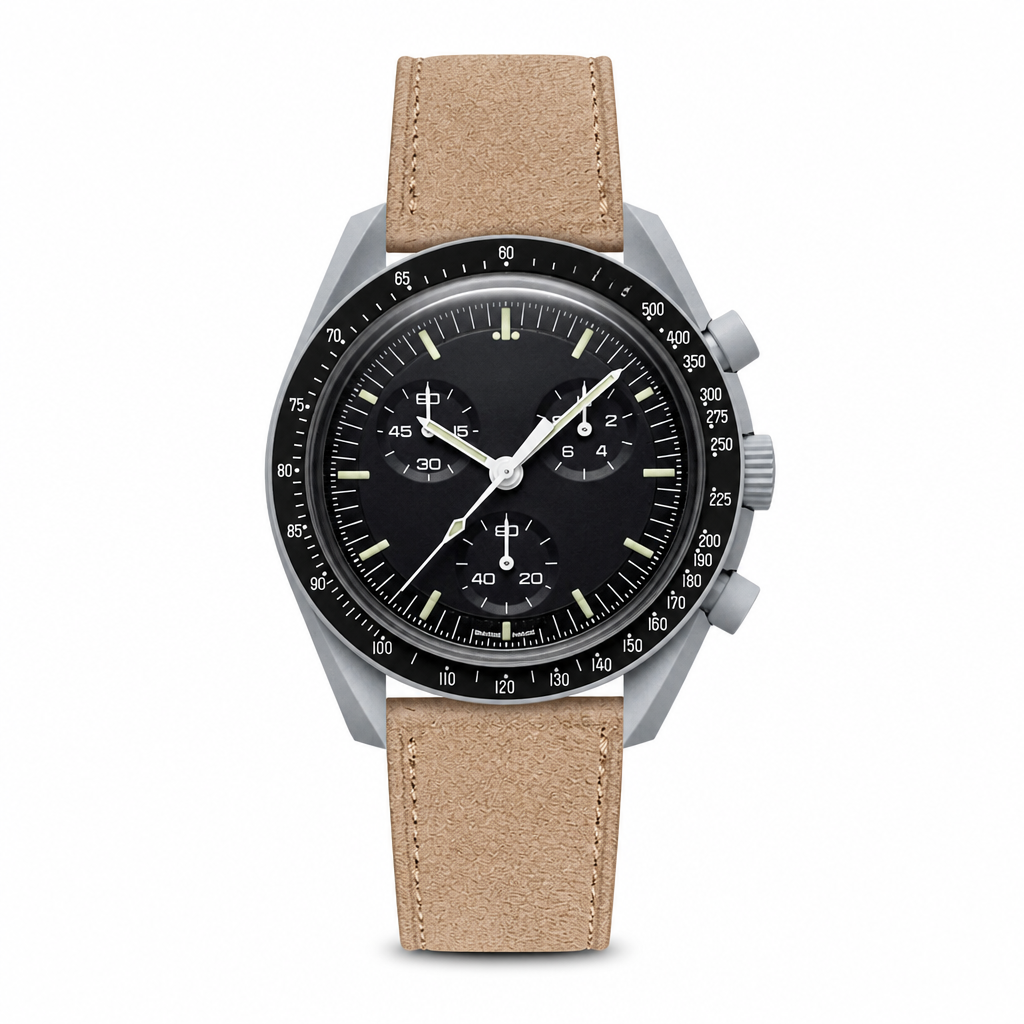 Black dial chronograph watch with beige suede strap on white background