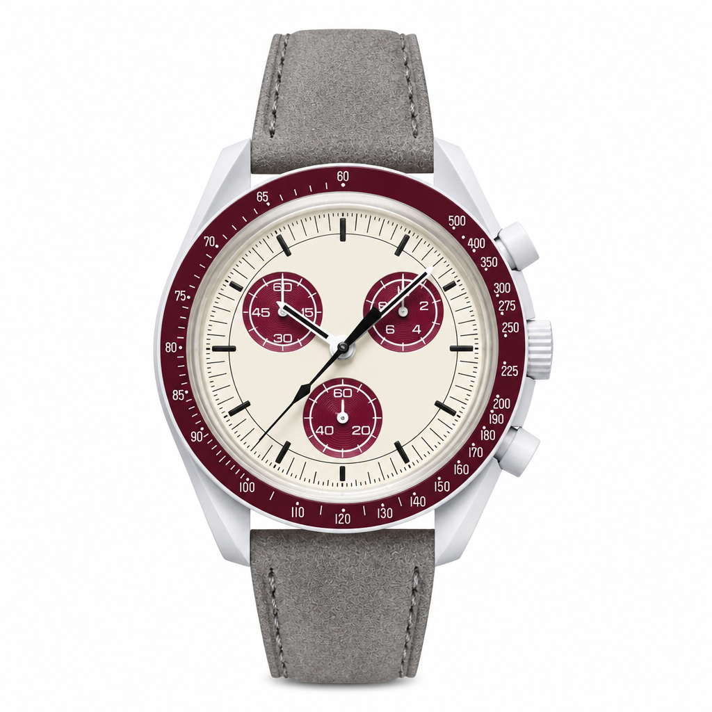 Chronograph wristwatch with cream dial, burgundy accents, and grey suede leather strap on white background