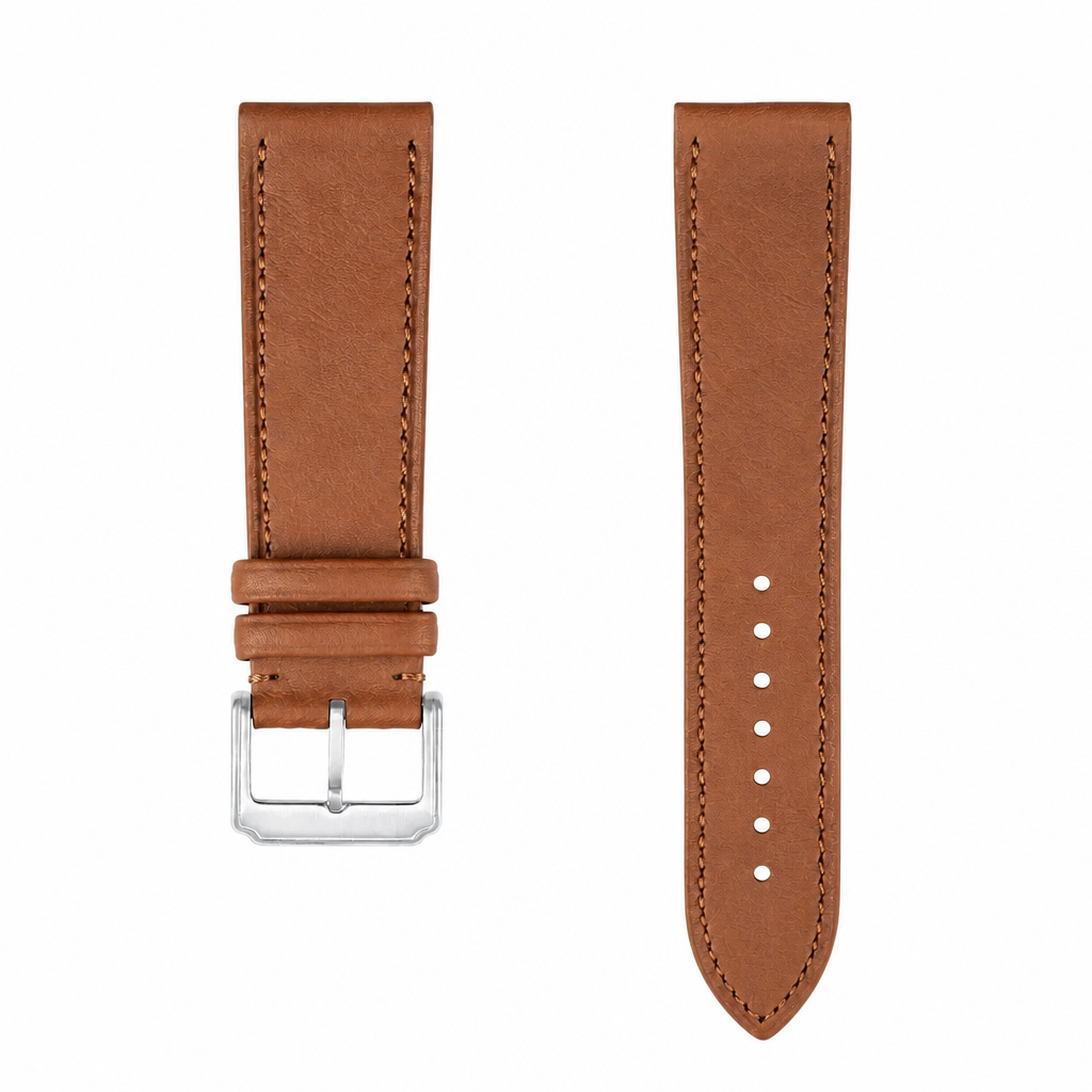 Brown leather watch strap with metal buckle on white background