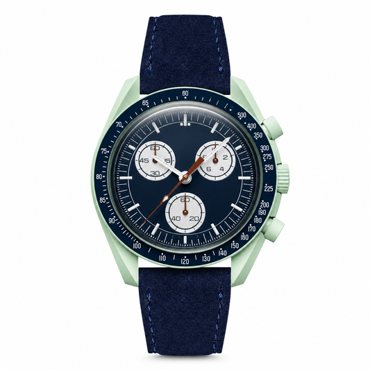 Chronograph watch with blue dial, dark blue suede strap, and light pastel green case on white background