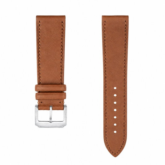 Brown leather watch strap with metal buckle on white background