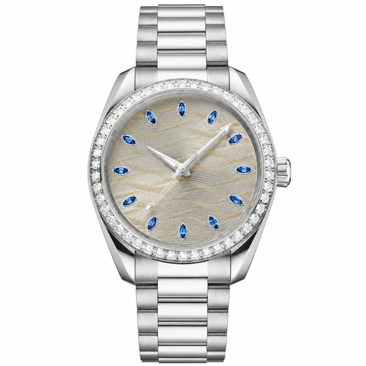 Elegant dress watch with silver case and bracelet, gray dial with blue markers, and embellished bezel
